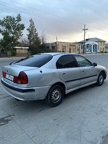 алмашам обмен: Mitsubishi Carisma: 1998 г., 1.8 л, Механика, Бензин, Хэтчбэк — 4