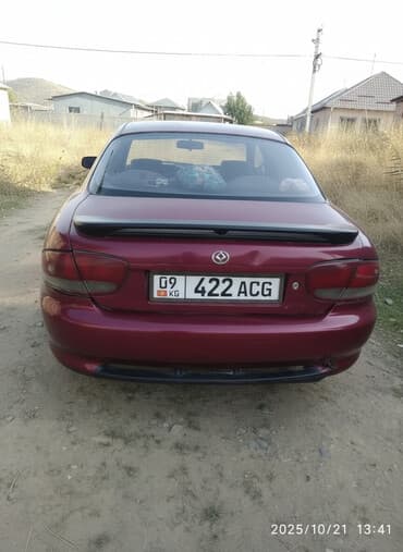 двигатель на виндом: Mazda Lantis: 1995 г., 1.6 л, Механика, Бензиновая, Седан — 1