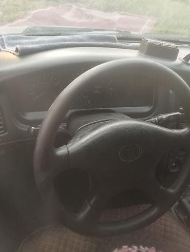 каракол авто: Toyota Carina E: 1997 г., 1.8 л, Кол менен иштөөчү, Газ, Универсал — 3
