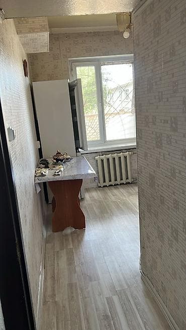 квартира в улан 2: Срочно продаю 2ком кв район гостиница 27дом 1этаж Планировка: - — 7