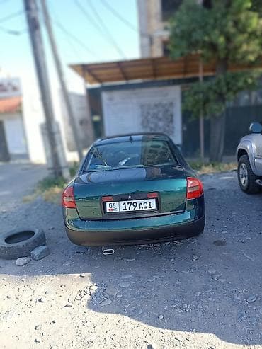 Унаа: Audi A6: 1998 г., 2.4 л, Кол менен иштөөчү, Бензин, Седан — 7