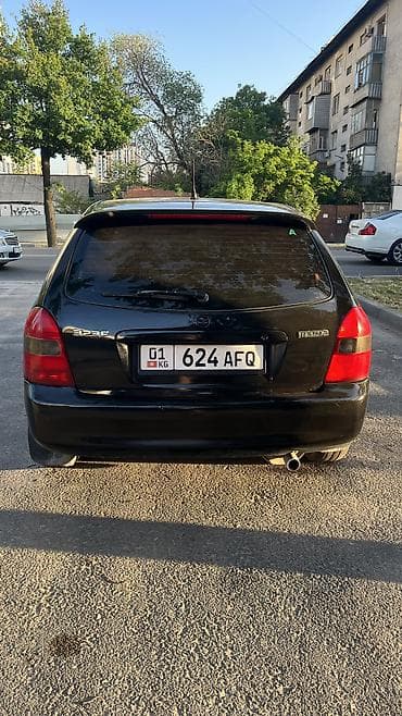 mazda f: Mazda 323: 2001 г., Механика, Универсал — 8