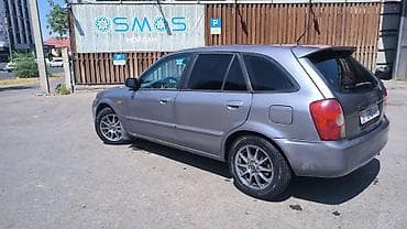 Mazda Familia: 2003 г., 1.6 л, Механика, Бензин, Универсал — 5