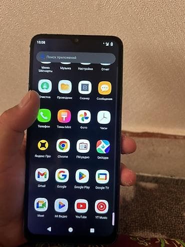 ми 9 а: Смартфон на Android с каплевидным вырезом фронтальной камеры и большим — 1
