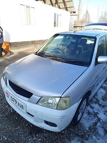 арзан машине: Mazda Demio: 2000 г., 1.5 л, Автомат, Бензин, Седан — 3