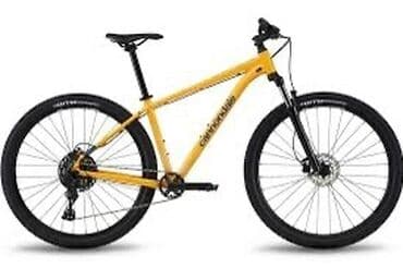 спартивный велосипед: Горный велосипед Cannondale яркого жёлтого цвета. Оснащён передней — 1
