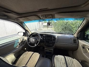 mazda 626 2001: Mazda Tribute: 2002 г., 3 л, Автомат, Бензин, Кроссовер — 5