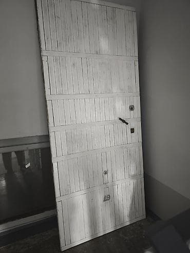 Металлическая гаражная дверь/полотно секционного типа. - Материал