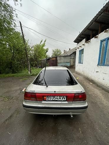 Mazda 626: 1990 г., 2 л, Механика, Бензин, Хэтчбэк — 5