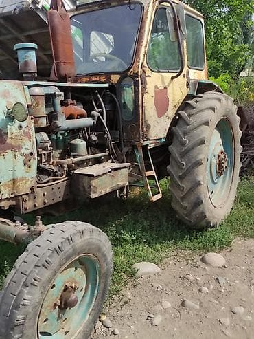 Унаа: Трактор колесный ЮМЗ‑6АЛ Описание: - Колесная формула 4x2, передняя — 3