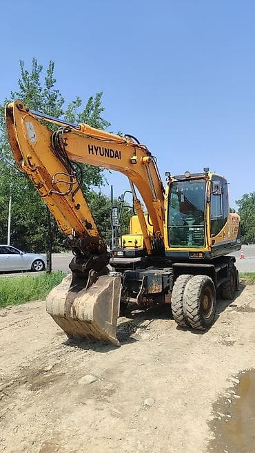 экскаваторы 140: Экскаватор, Hyundai, 2010 г., Колесный — 5