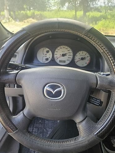 киа на продажу: Mazda 626: 2001 г., 2 л, Механика, Бензин, Универсал — 4