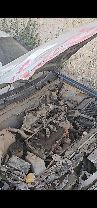 Разбор Nissan Almera (N16), серебристый седан, разбор по запчастям — 4