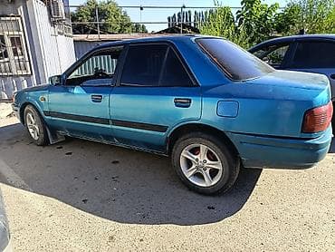 Транспорт: Mazda 323: 1991 г., 1.6 л, Механика, Бензин — 7