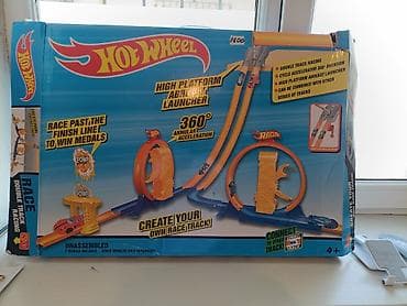 Детские аттракционы: Игровой набор трассы Hot Wheels: двойная гоночная трасса с петлями и — 1
