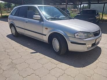 dodje ram: Mazda Familia: 1999 г., 1.6 л, Механика, Бензин, Универсал — 1