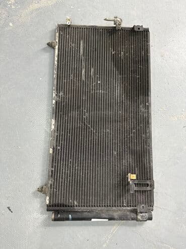 конда: Радиатор кондиционера Тойота Ипсум 2003
Toyota Ipsum рад Конд — 1