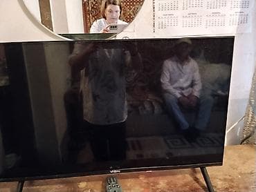 Телевизор VASIN, диагональ около 32–40". - LED‑экран, тонкие рамки