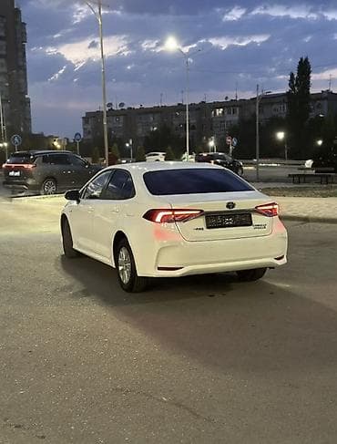 byd e2 2019: Toyota Corolla: 2021 г., 1.8 л, Вариатор, Гибрид, Седан — 5