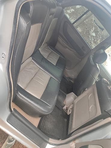 зил облицовка: Mazda 626: 2000 г., 2 л, Бензин, Хэтчбэк — 5