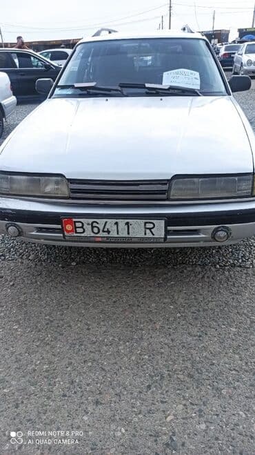 домик вагон: Mazda 626: 1991 г., 2 л, Механика, Бензиновая, Универсал — 3