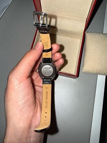 geneva platinum: Часы RADO Jubile (кварцевые) - Корпус округлой формы, черный — 1