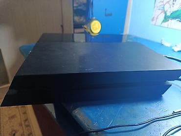 диски для игр: PlayStation 4 (оригинальная модель, “fat”) с двумя геймпадами — 3