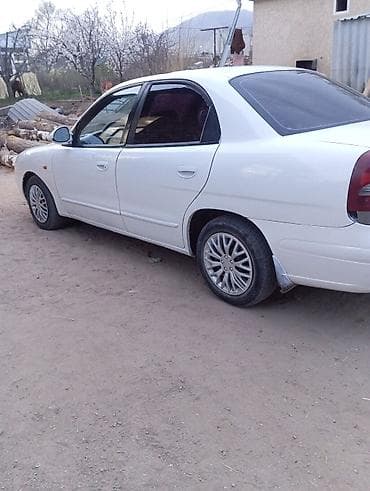 дайхатсу сирион 2003: Daewoo Nubira: 1999 г., 1.5 л, Ручные, Бензин — 2