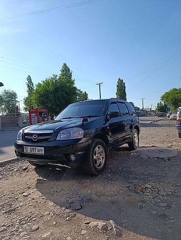 хендай тускани 2002: Mazda Tribute: 2002 г., 2 л, Автомат, Бензин, Внедорожник — 3