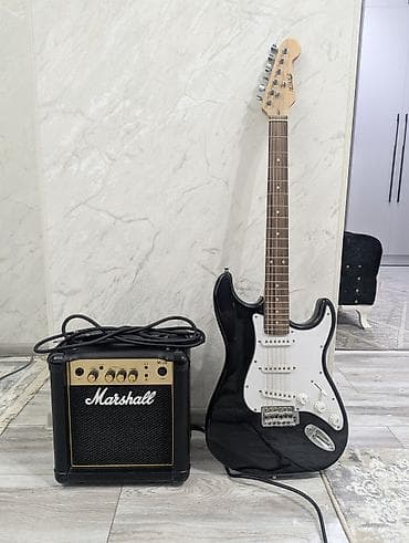 stratocaster: Электрогитара Homage + комбоусилитель Marshall MG10 + кабель Peavey — 1