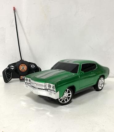 aston martin dbs: Радиоуправляемая модель автомобиля (масштаб ориентировочно 1:16–1:18) — 1