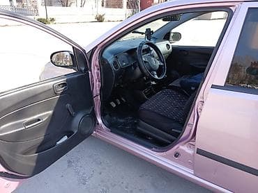 дайхатцу сирион: Daihatsu Cuore: 2005 г., 1 л, Ручные, Бензин, Хэтчбэк — 5