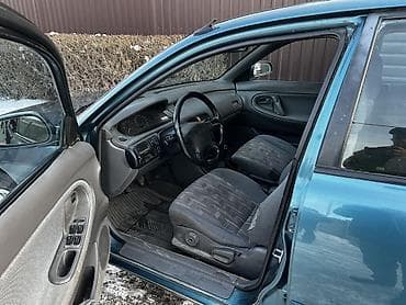 привазной матор 1: Mazda : 1993 г., 2 л, Механика, Бензин, Хэтчбэк — 6