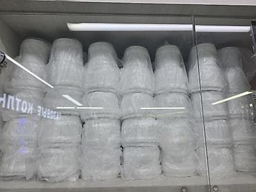 Одноразовые прозрачные пластиковые стаканы в индивидуальной упаковке