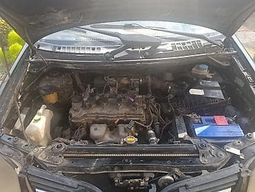 салон машина: Nissan Almera Tino: 2003 г., 1.8 л, Механика, Бензин, Хэтчбэк — 4