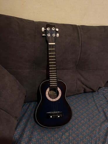 пианино белое: Укулеле (сопрано) - Тип: акустическая укулеле, размер сопрано — 1