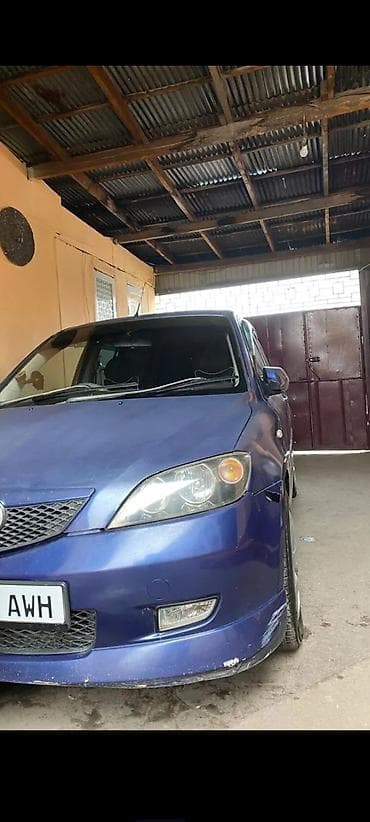 Mazda Demio: 2003 г., 1.5 л, Автомат, Бензин, Хэтчбэк