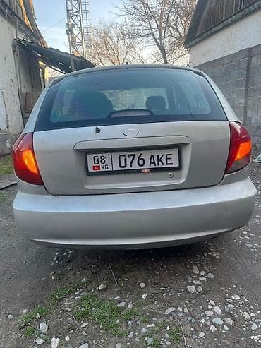 автомобиль тико: Kia Rio: 2005 г., Механика, Бензин, Хетчбек — 3