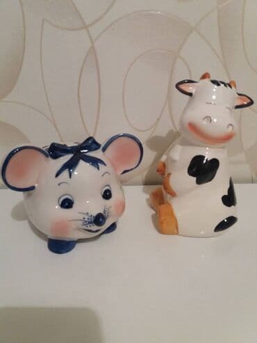 Продаю копилки для детей.
1шт 
Высота коровки - 18 см, мышки - 12 см