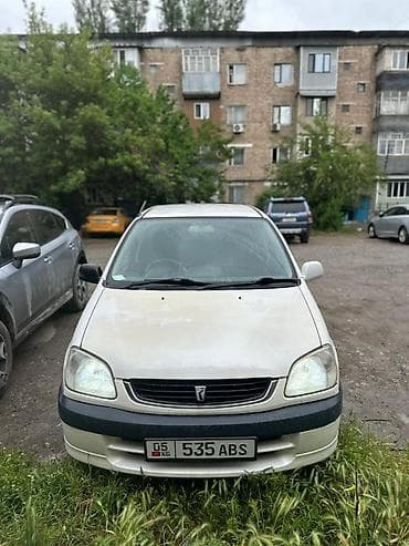 телешка на авто: Toyota Raum: 2000 г., 1.5 л, Автомат, Бензин, Хэтчбэк — 9