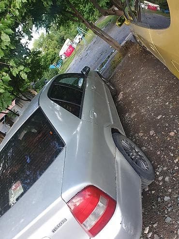 Mazda 323: 2002 г., Автомат — 5