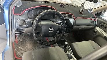super cub: Mazda 323: 2002 г., 1.6 л, Механика, Бензин, Универсал — 5