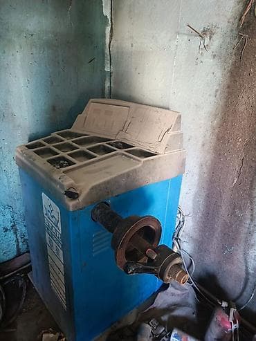 Упаковочно-фасовочные аппараты: Стенд для балансировки колес (шиномонтажное оборудование) - — 1