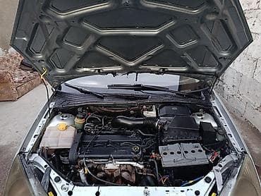 byd e1: Ford Focus: 1998 г., 1.8 л, Механика, Бензин, Хэтчбэк — 7