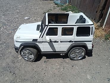 Детский транспорт: Детский электромобиль Mercedes-Benz G-класса AMG (лицензионный стиль) — 2