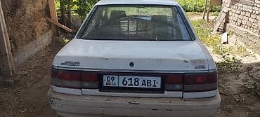 Транспорт: Mazda 626: 1991 г., 2 л, Механика, Бензин, Седан — 2