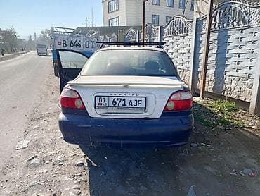 дом на обмен: Kia Sephia: 1997 г., Бензин, Седан — 4