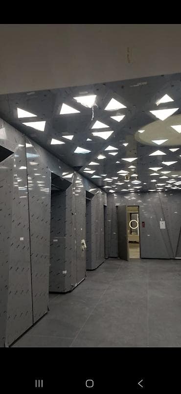 Подвесные потолочные системы и декоративные панели для интерьеров