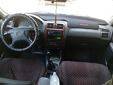 devo tiko: Mazda 626: 1998 г., 1.8 л, Механика, Бензин, Хэтчбэк — 5