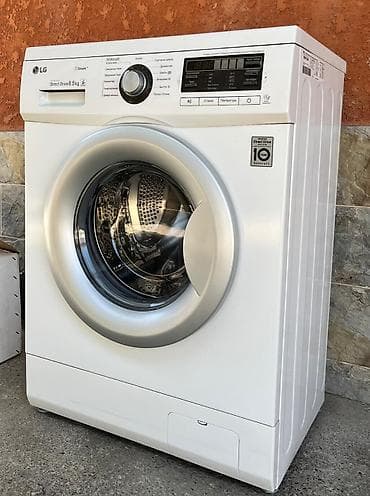 Стиральная машина LG в идеальном состоянии никаких царапин работает